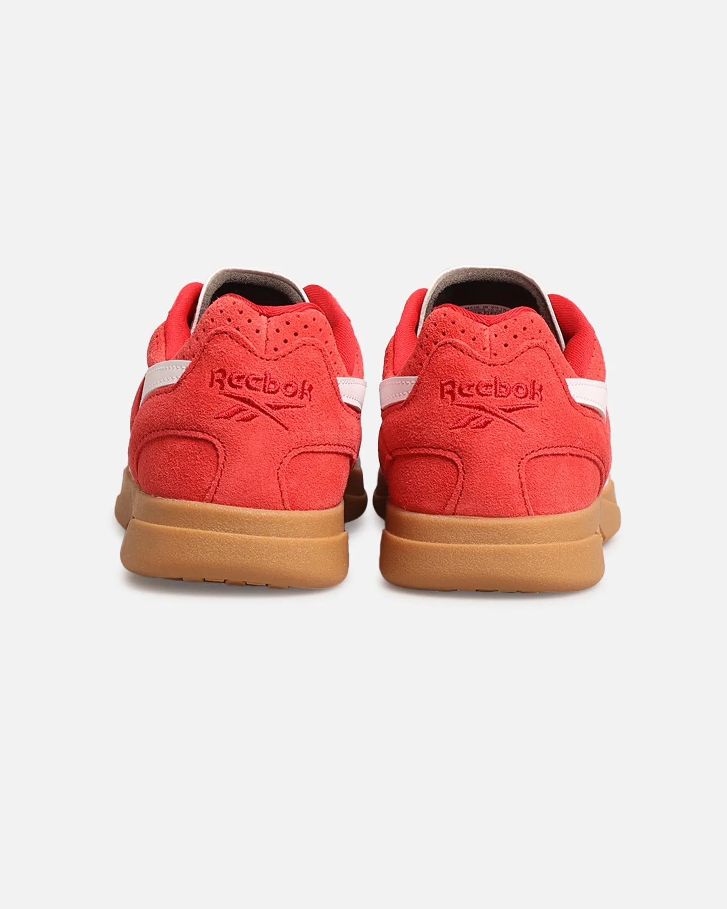 Reebok Women's Hammer Street Red Difference In Soccer Cleats And Football Cleats