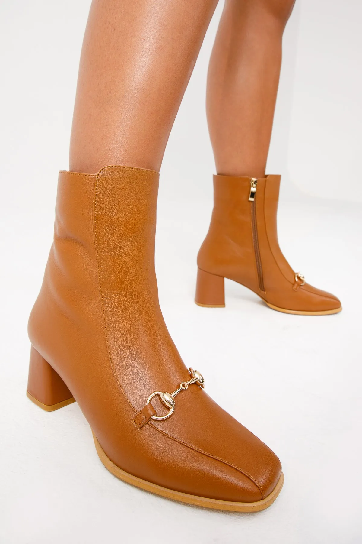 The Bukres Tan Leather Block Heel Mid Calf Women Boot Hunter Play Boots